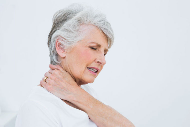 Woman dealing with neck pain from Neuropathy